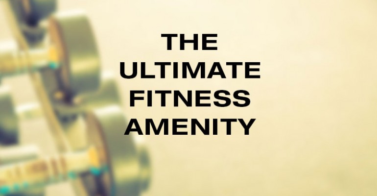 Weights with the words the ultimate fitness amenity on top